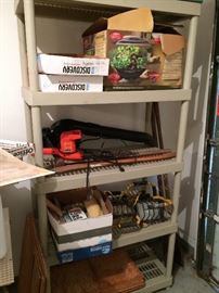 Leaf blower (SOLD), seed starter (SOLD), painting supplies (SOLD), auto/garage lighting (SOLD), plastic shelving unit (SOLD).