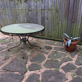 Glass and Wrought Iron Table without chairs