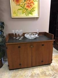 Raise this on some hairpin legs and you'll have the perfect bar cabinet