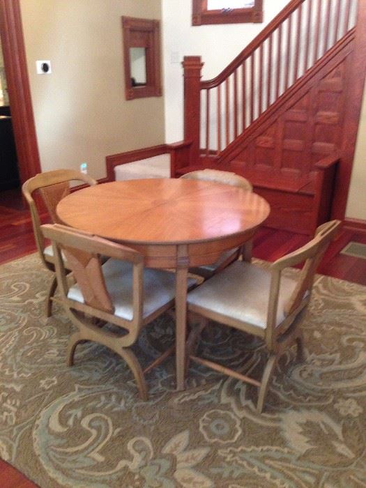 Great smaller dining table with 4 chairs.  Table does have 1 leaf