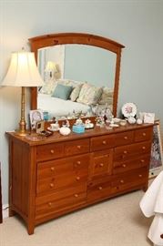 Dresser with mirror in master bedroom.