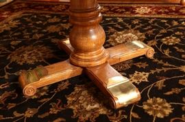 Brass protects table base.