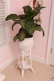 Wicker plant stand.