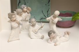 Lladro angel figures.