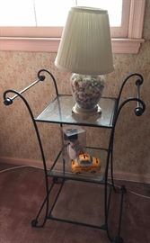 wrought iron side table and shell-filled lamp