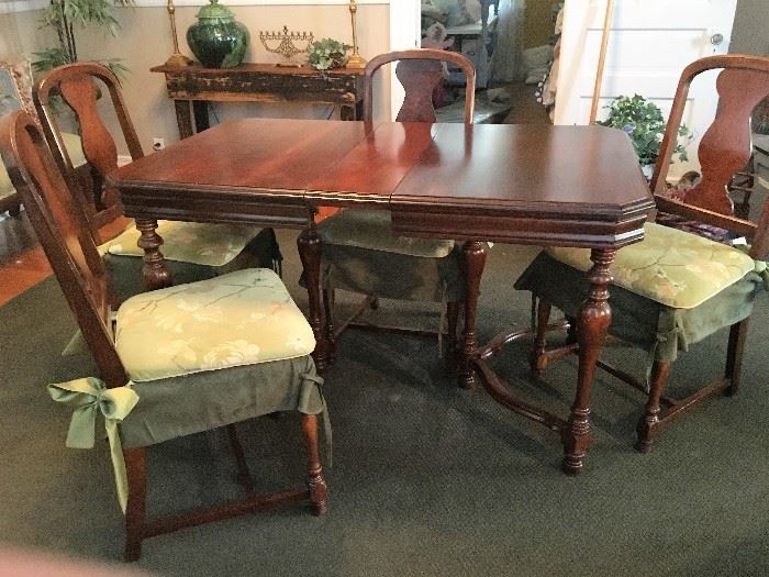 Walnut table with 4/chairs and 2 leaves