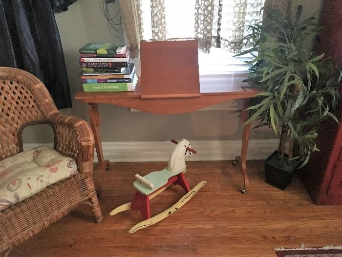 Adjustable table with book holder