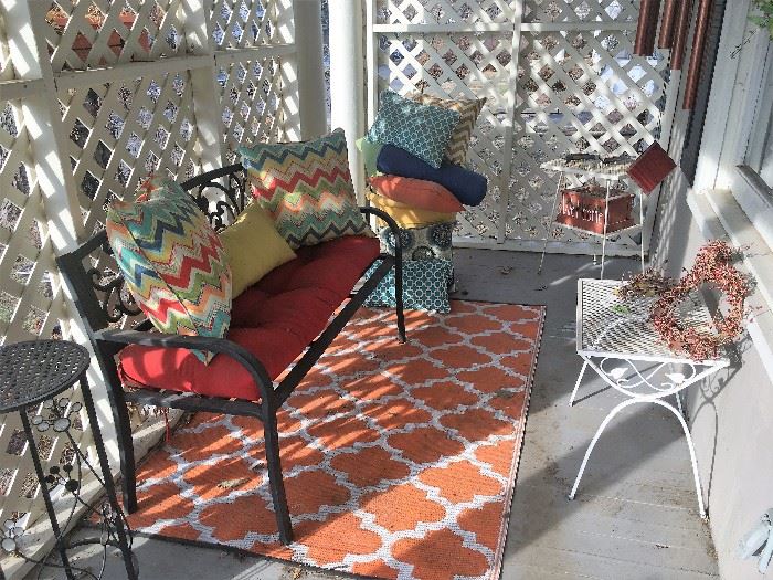 Outdoor bench, pillows and rug