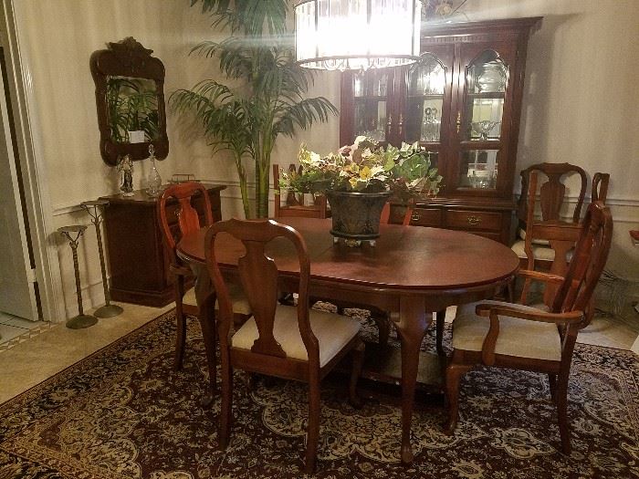 dining room table and chairs, area rugs