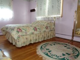 Bedroom #1 Brass Full Size Bed with headboard- Oval area rug- Bedding for Full size bed. Window Treatment