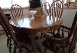 Antique Dining Room Set. Solid Wood Oval Table with one extra Leaf, 5 Tall Chairs 1- Tall Captain Chair for a Total of 6 Chairs.