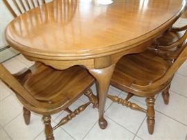 Antique Dining Room Set. Solid Wood Oval Table with one extra Leaf, 5 Tall Chairs 1- Tall Captain Chair for a Total of 6 Chairs.