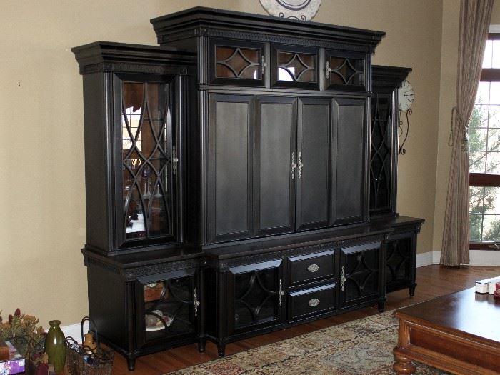 Entertainment center - 28-1/2" total depth x 85-1/2"H x 110"W (dimensions of TV area is 51"W x 31-1/2H) 