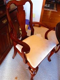 1 o2 of the armed dining chairs