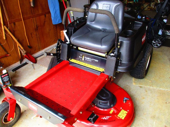 4 yr old TORO zero turn riding lawn machine 42"cut excellent condition. Powered by Kohler Courage 19 w/extra battery