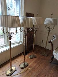Matched set of four floor lamps