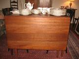 A handmade drop leaf table