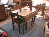 A great primitive drop leaf table with painted legs, with Mule back chairs