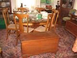 A wonderful Oak Pedestal Table with Claw Feet with a Center Post Pedestal, with 6 antique chairs. A very nice small antique pine blanket chest!