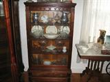 An antique 4 shelf China and Curio Cabinet!