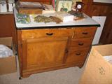 A Granite Top Kitchen Cabinet.