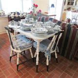 A cute country table and 4 chairs painted white and black