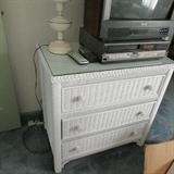A White Wicker Chest of Drawers