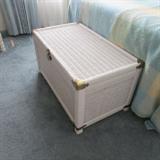A White Wicker Blanket Chest