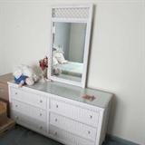 A White Wicker Double Dresser and Mirror
