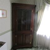 A Henkel Harris Corner Cupboard