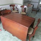 A Henkel Harris Drop Leaf Table almost to the floor
