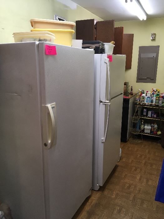 freezer, refrigerator, free standing dishwasher, cleaning supplies