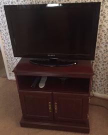 TV and TV Stand.