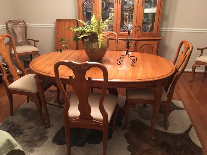 This is the matching solid oak dining table and six chairs also comes with two leaves and has Queen Anne legs.  The entire set retailed for $8,000.00