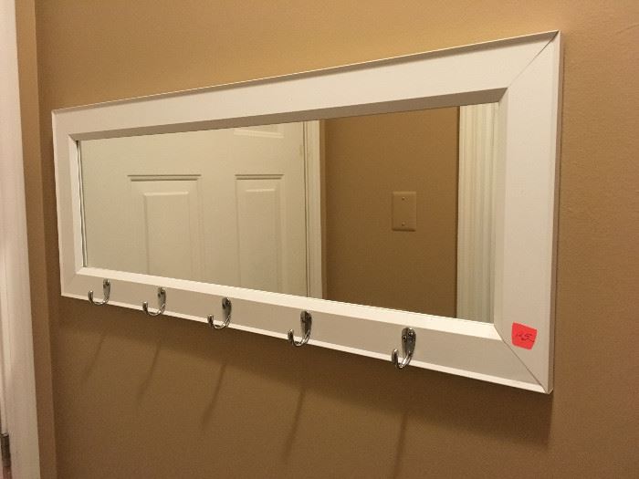 This is a mirrored coat rack -- perfect for the entry room.