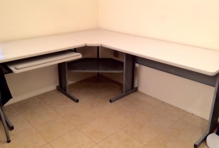 Corner desk with slideout tray and lower storage shelf