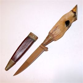 Puma Solingen Rostfrei Vintage Hoof Handle Knife: A Puma Solingen Rostfrei vintage hoof handle knife with brass trimmed blade sheath. This small normal blade knife features a taxidermy mammal hoof for the handle with a brass cap for the bottom of the hoof and ringed brass collar for the transition to the blade. Cheek of the blade is stamped “Puma Solingen, Made in Germany, Rostfrei” along with the puma logo. A specialized leather cap sheath for the blade is trimmed on both ends with the same ringed brass collars. Made in Germany.