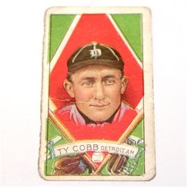 Authentic 1921 T202 Hassan Ty Cobb Card: An authentic 1921 T202 Hassan Ty Cobb card features and illustration of Ty Cobb’s face with a Detroit cap set in a red triangle with green background. This card was clipped for a T202 Hassan Triple Folder. A banner at the bottom reads “Ty Cobb Detroit AM”. On the back is a bio of Tyrus Cobb and a hallmark for Hassan Cork Tip Cigarettes. Card is colorful and in good shape for it’s age having been circulated.
