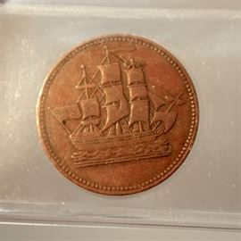 Breton 997 Ships Colonies & Commerce Token: A Canadian “Ships Colonies & Commerce” token, ICCS Certified & Graded: F-12, Breton 997; Lees 30. Coin features a relief likeness of a tall ship with sails out on one side of the coin and the words “Ships Colonies & Commerce” stamped to the reverse side. Presented in sealed plastic folder by the International Coin Certification Service (ICCS), Certification No. XSE 324.