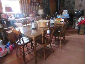 Ethan Allen table with 2 leaves and 6 chairs.  