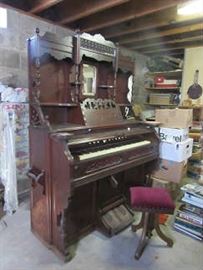 Victorian Organ and adjustable seat. The wood is walnut and is beautiful.  