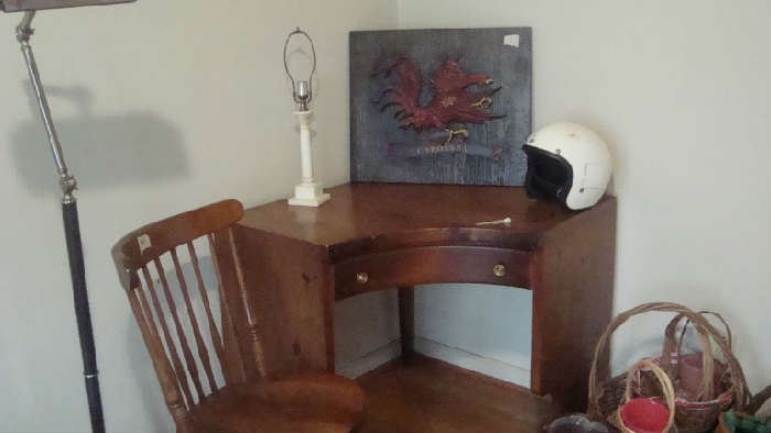 corner desk with vintage Gamecock wall decoration
