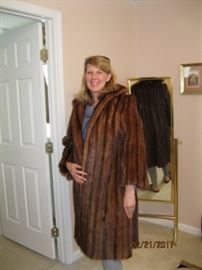 Lovely vintage full length mink on our model, Kehli. Good view of the back of coat in the cheval mirror!