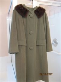 This say's 60's and Jackie O! Mink collar in excellent condition. Great vintage piece.