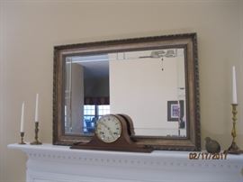 Beveled mirror with gilt frame