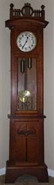 Antique Oak Grandfather-Tall Case Clock with Crossed Arrows ("HAC" Hamburg Amerikanische Uhrenfabrik/Hamburg American Corporation) on Porcelain Dial Face, Brass Weights and Pendulum. Cc.1873-1910 (82.5"H x 20.5"W x 10"D)