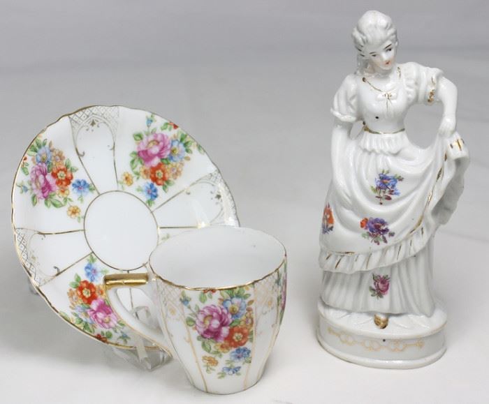 Occupied Japan Porcelain Demitasse Cup and Saucer with wire stand shown with Japan Porcelain 6" Lady Figurine