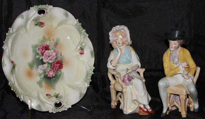 Victoria Austria Porcelain plate shown with a Pair of DEP & Hallmark for the Porzellanfabrik Carl Schneider & Hutschenruther Seated Man and Woman Figurines