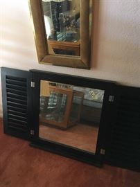 wall mirror with shutters that close 