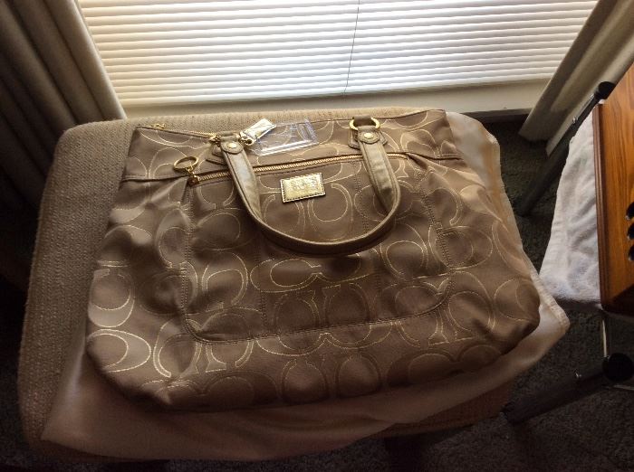 ONE OF SEVERAL REAL COACH BAGS 